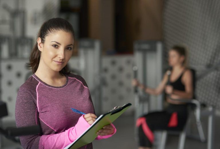 Portrait of female coach at the gym